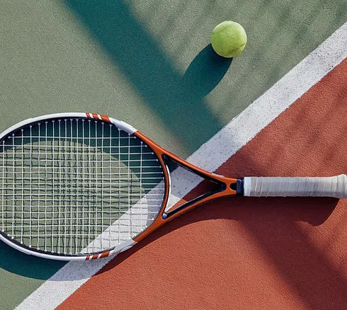 Tennis racket and ball